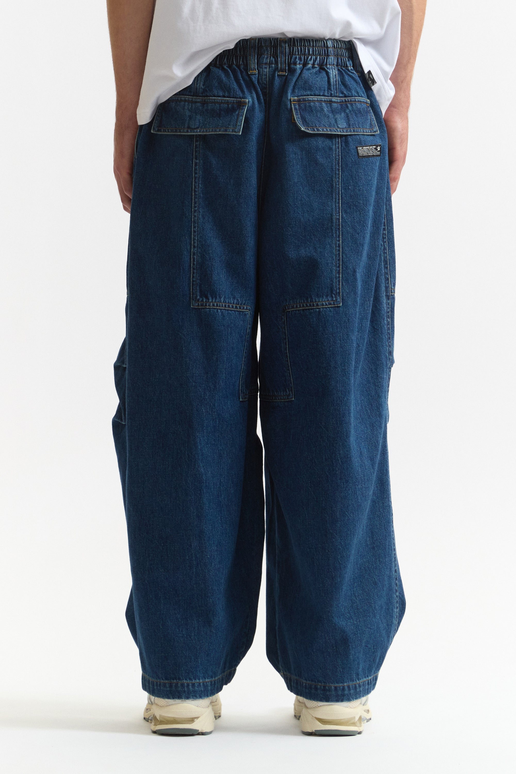 The DENIM PONDERING PANTS available online with global shipping, and in PAM Stores Melbourne and Sydney.