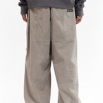 The TWO MIL PONDERING PANT - BEIGE available online with global shipping, and in PAM Stores Melbourne and Sydney.