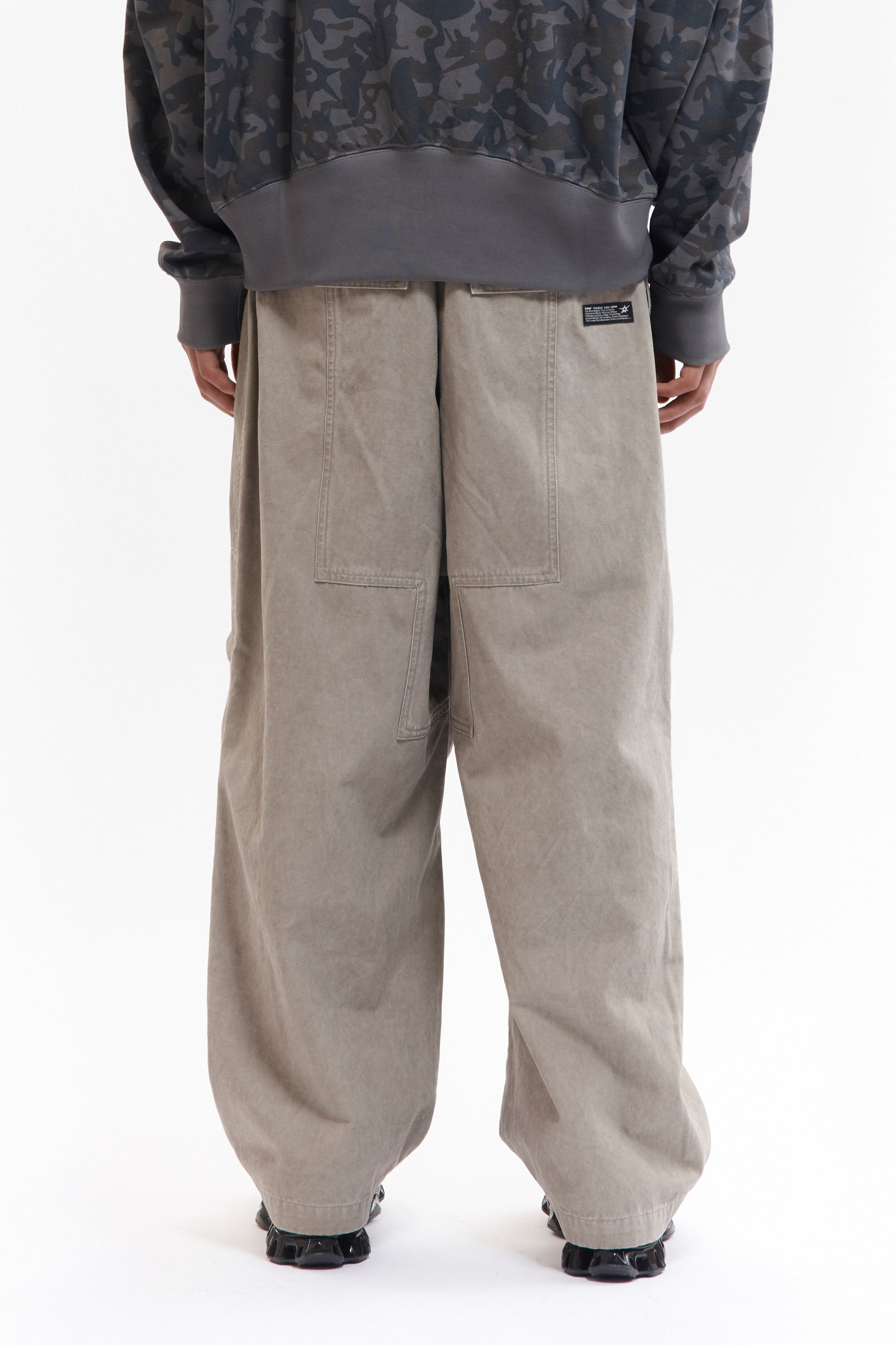The TWO MIL PONDERING PANT - BEIGE available online with global shipping, and in PAM Stores Melbourne and Sydney.