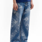 The COCO BANDANA OVER PRINT JEANS available online with global shipping, and in PAM Stores Melbourne and Sydney.