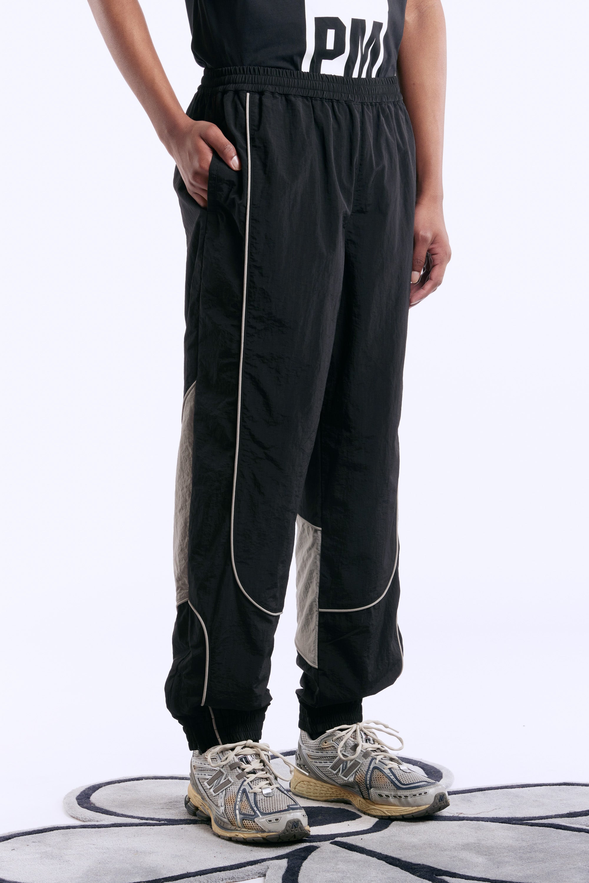 The TRACKTION PANELLED TRACK PANT  available online with global shipping, and in PAM Stores Melbourne and Sydney.