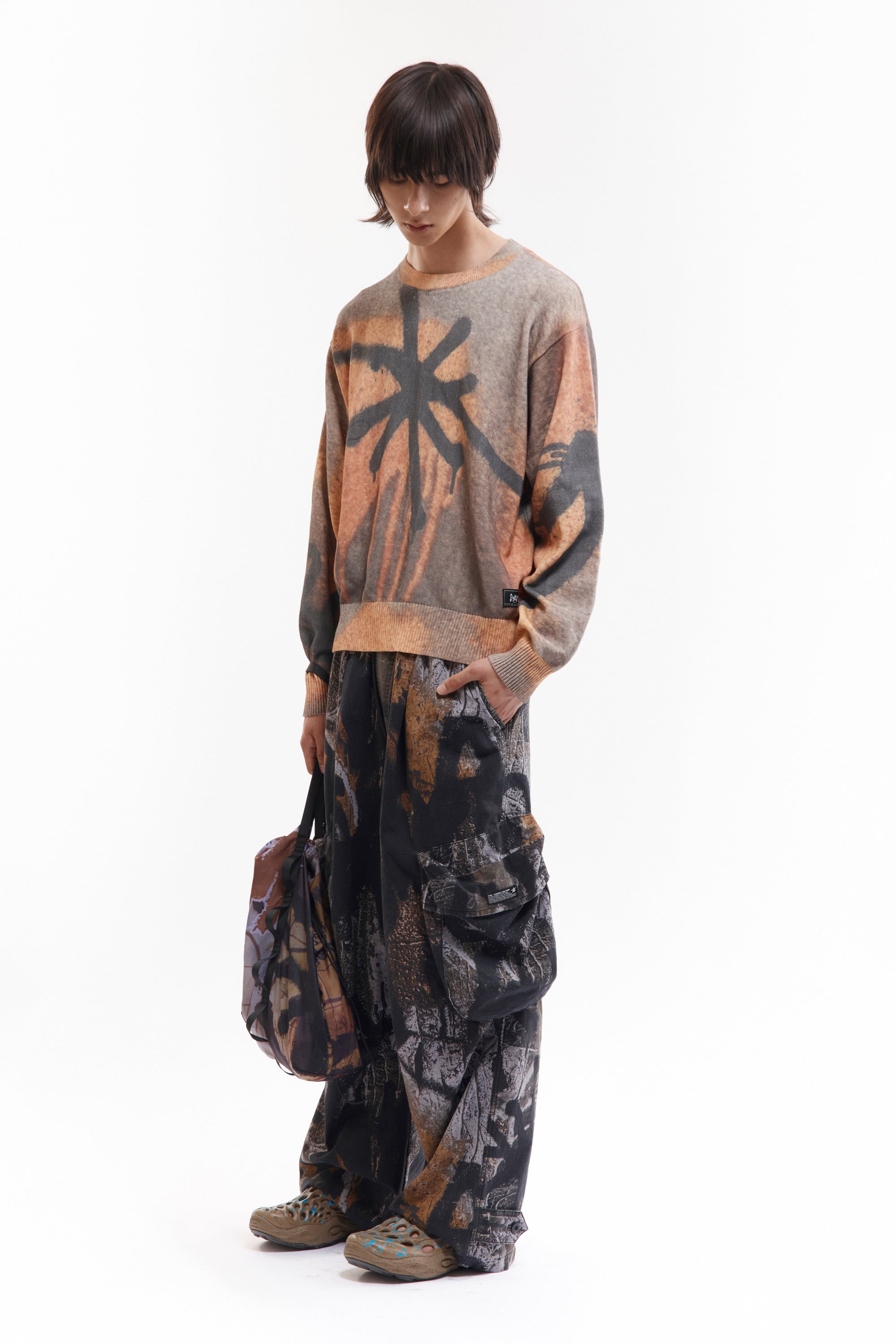 The GETTING OVER PRINTED KNIT CREWNECK available online with global shipping, and in PAM Stores Melbourne and Sydney.