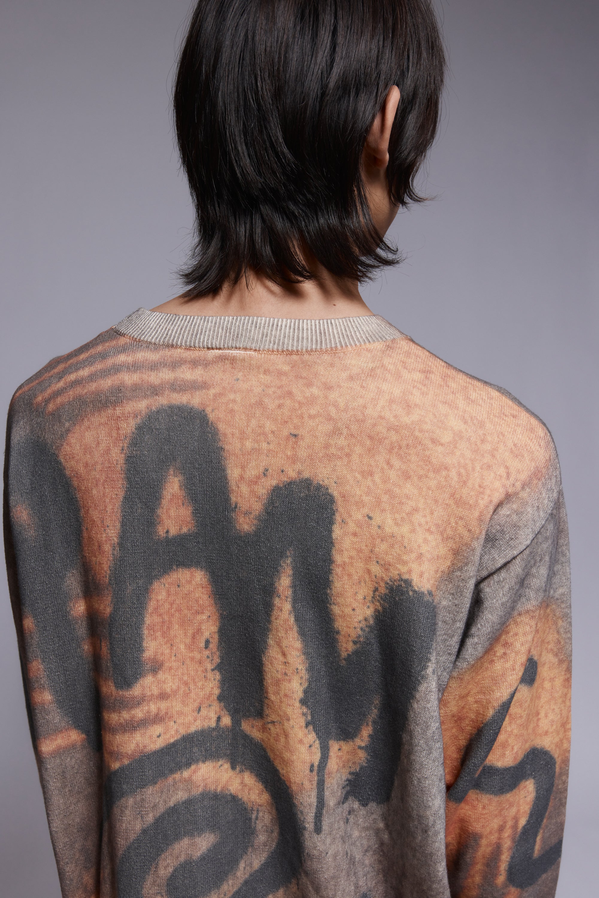 The GETTING OVER PRINTED KNIT CREWNECK available online with global shipping, and in PAM Stores Melbourne and Sydney.