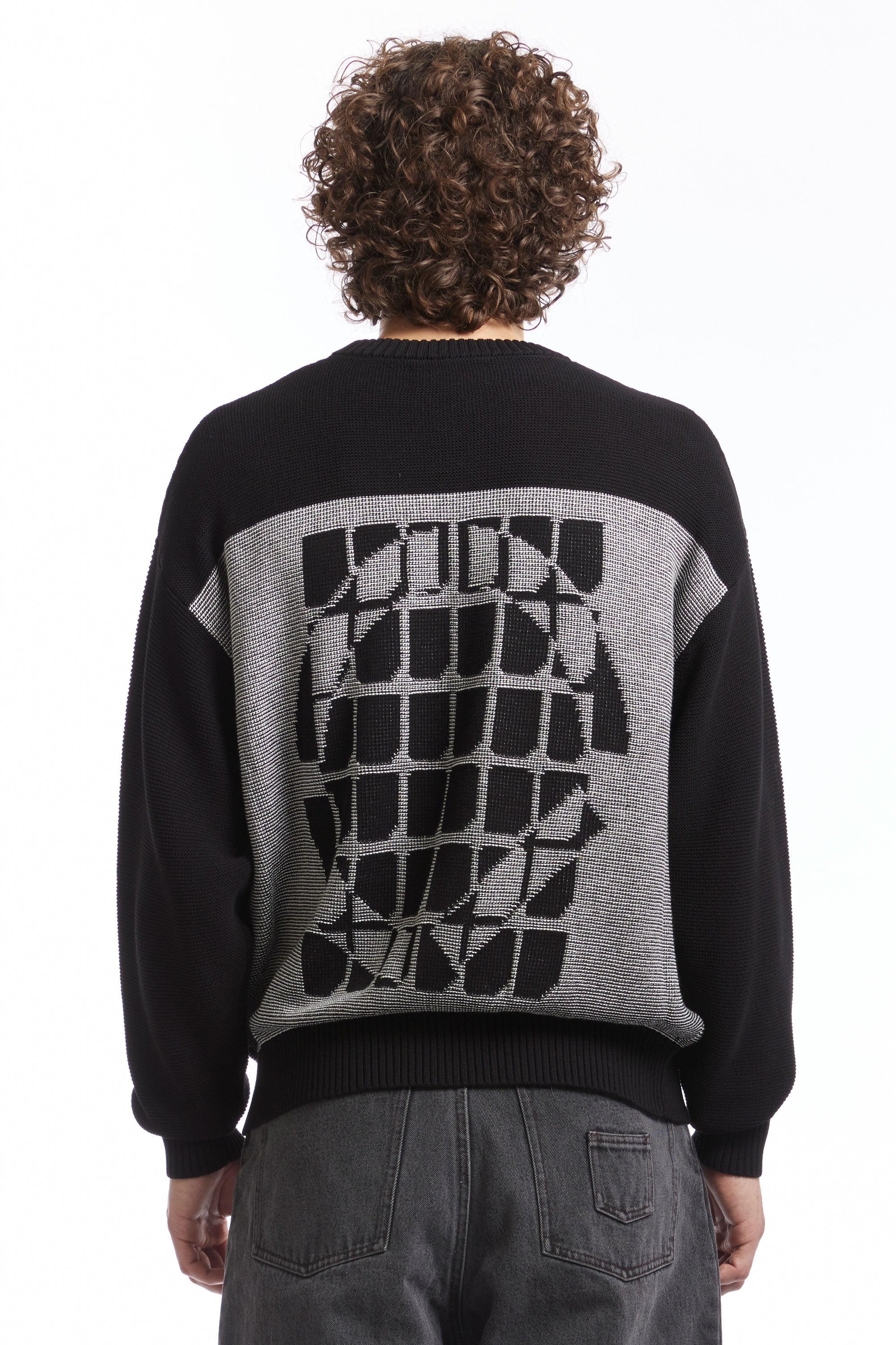 The AGENT KNIT SWEATER BLACK available online with global shipping, and in PAM Stores Melbourne and Sydney.