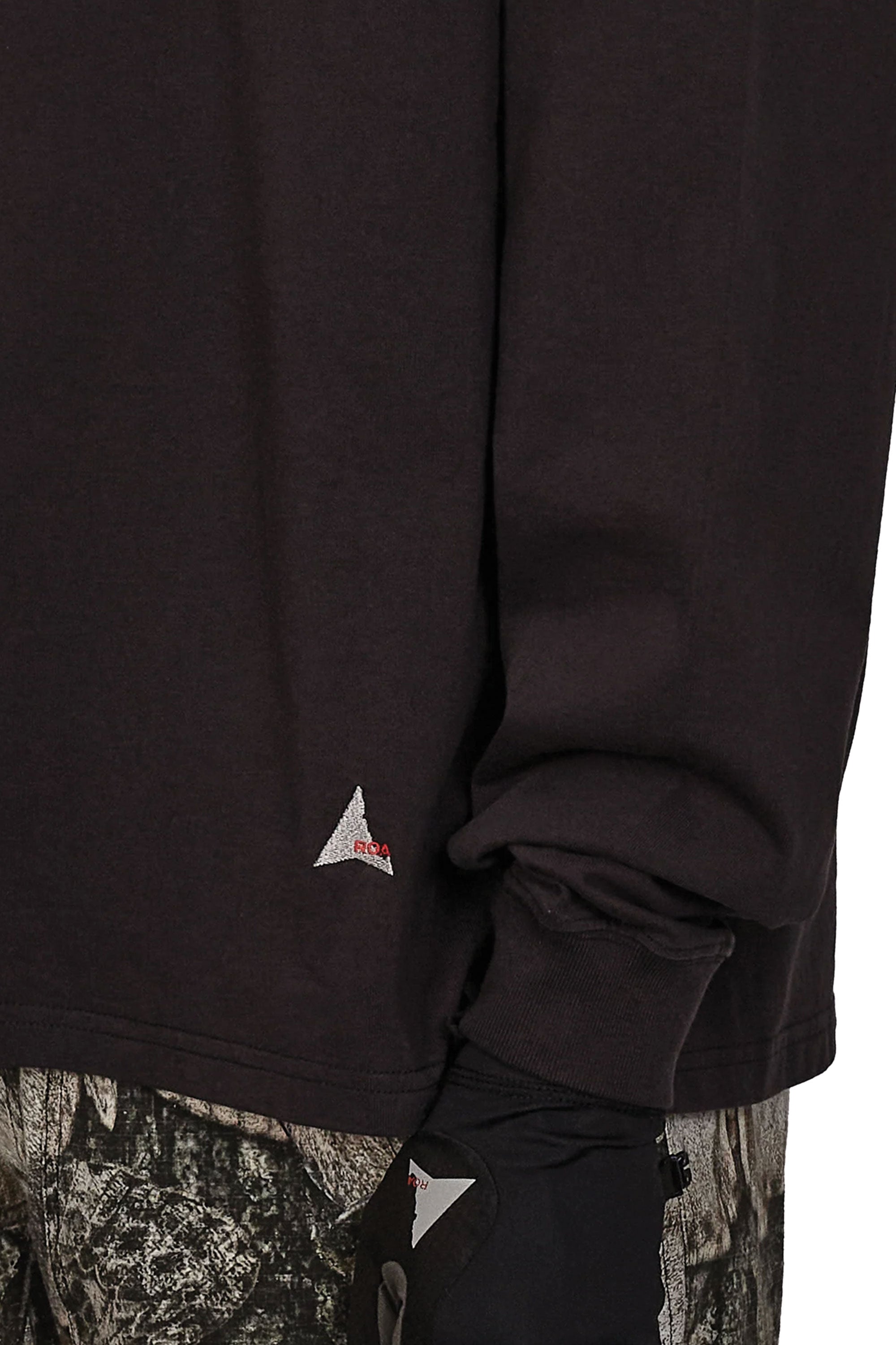 The Astrio Long Sleeve Polo Washed Black available online with global shipping, and in PAM Stores Melbourne and Sydney.