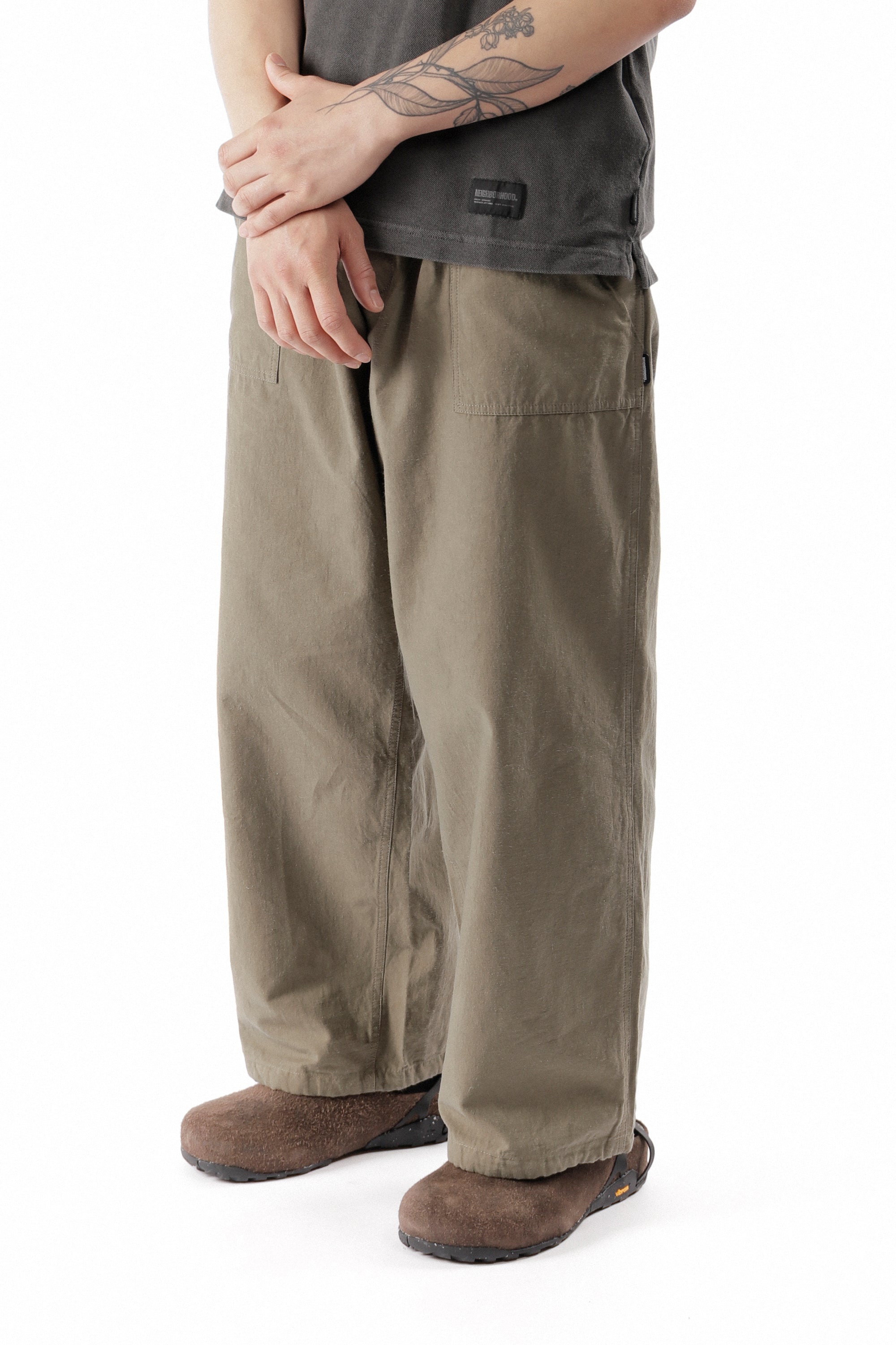 The WIDE BAKER PANTS WOVEN PANTS OLIVE DRAB available online with global shipping, and in PAM Stores Melbourne and Sydney.