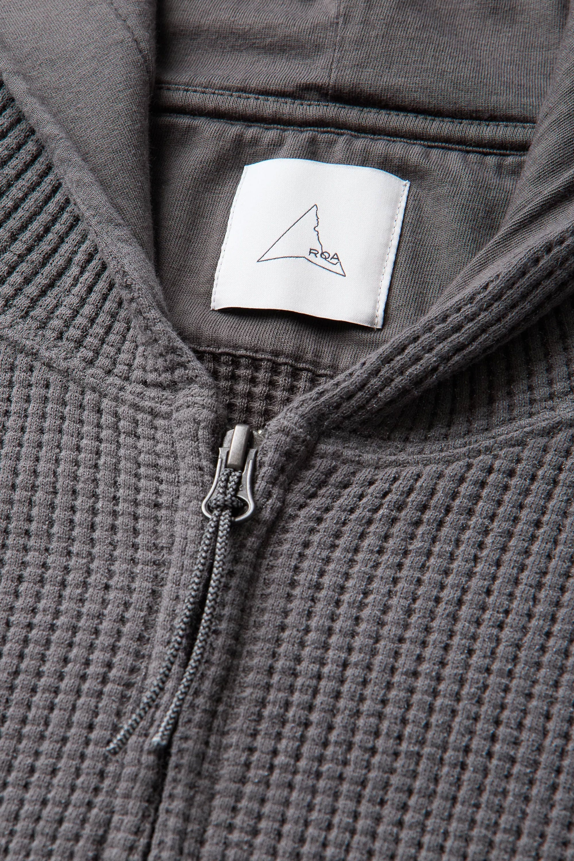 The Bee Sun Faded Organic Waffle Zip Up Hoodie Graphite available online with global shipping, and in PAM Stores Melbourne and Sydney.