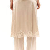 The BEIGE LINGERIE TROUSER available online with global shipping, and in PAM Stores Melbourne and Sydney.
