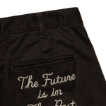 The WIDE CHINO PANTS BLACK available online with global shipping, and in PAM Stores Melbourne and Sydney.