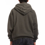 The PIGMENT DYED SWEAT HOODIE BLACK available online with global shipping, and in PAM Stores Melbourne and Sydney.