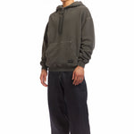 The PIGMENT DYED SWEAT HOODIE BLACK available online with global shipping, and in PAM Stores Melbourne and Sydney.