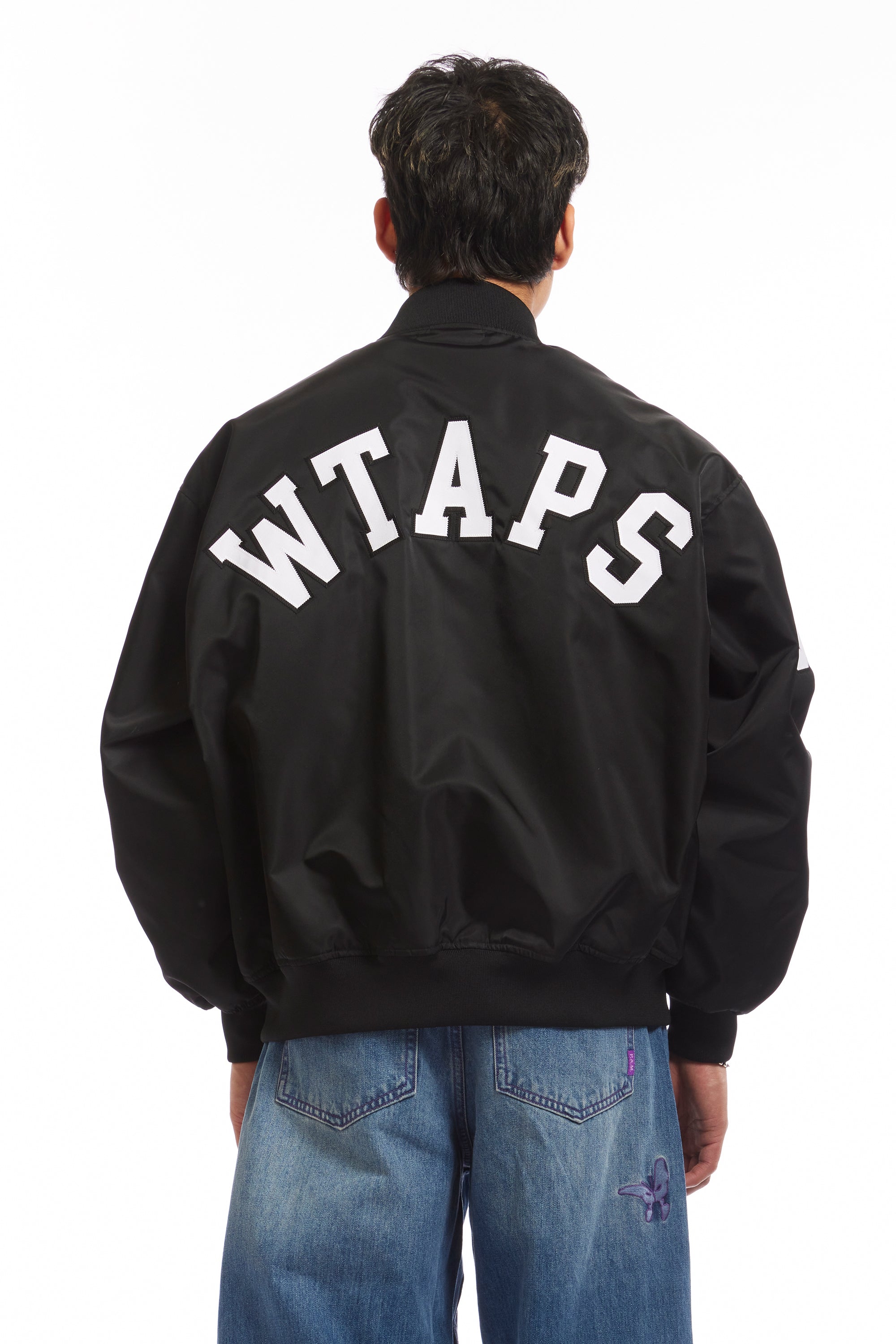 The NYLON TWILL TEAM JACKET BLACK available online with global shipping, and in PAM Stores Melbourne and Sydney.