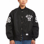 The NYLON TWILL TEAM JACKET BLACK available online with global shipping, and in PAM Stores Melbourne and Sydney.