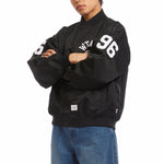 The NYLON TWILL TEAM JACKET BLACK available online with global shipping, and in PAM Stores Melbourne and Sydney.