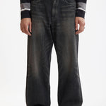 The SS26 WASHED DENIM DP WIDE PANTS BLACK available online with global shipping, and in PAM Stores Melbourne and Sydney.