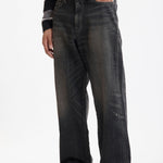 The SS26 WASHED DENIM DP WIDE PANTS BLACK available online with global shipping, and in PAM Stores Melbourne and Sydney.