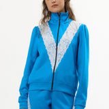 The BLUE LACE TRACKSUIT JACKET available online with global shipping, and in PAM Stores Melbourne and Sydney.