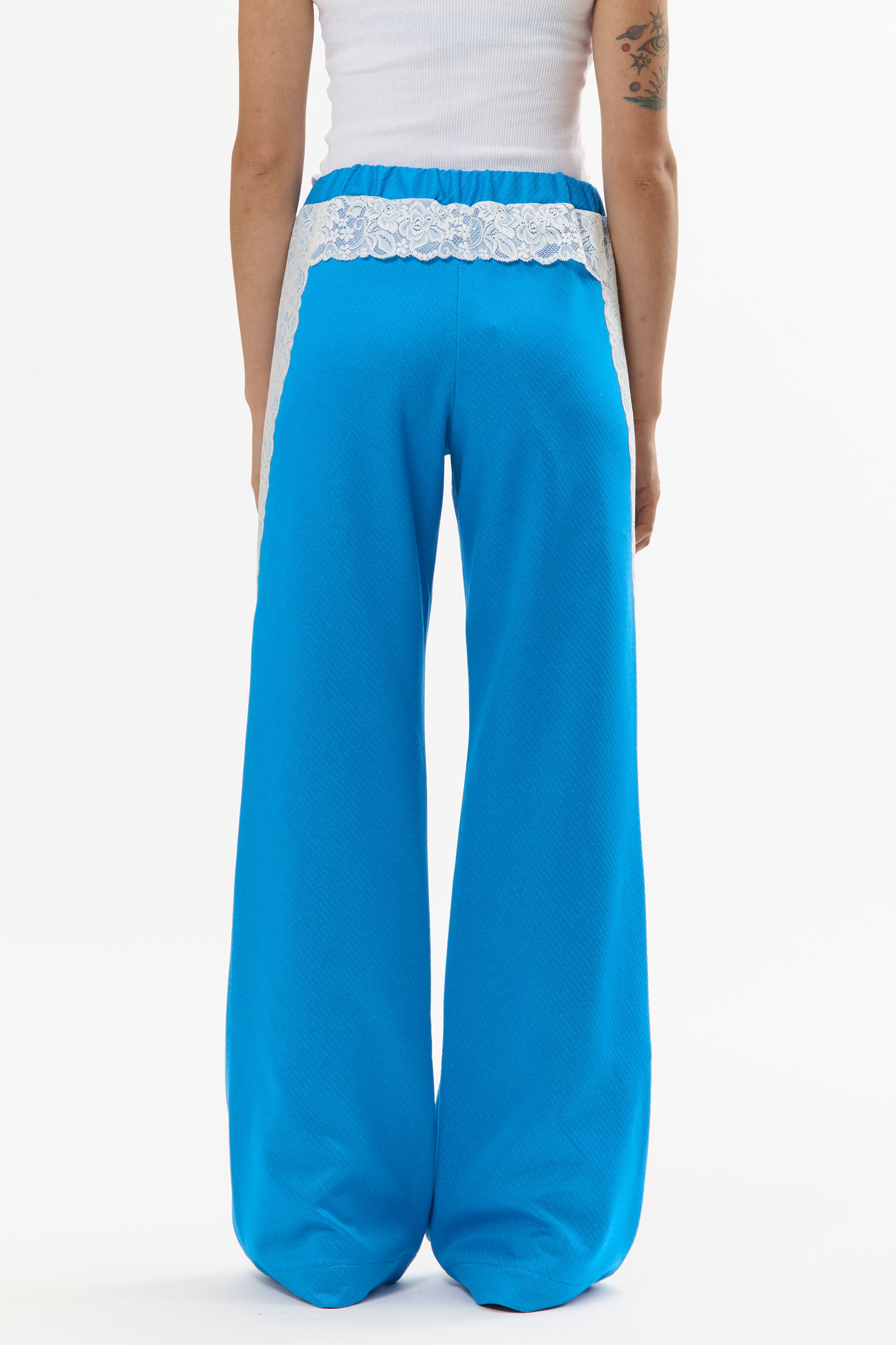 The BLUE LACE TRACKSUIT TROUSERS available online with global shipping, and in PAM Stores Melbourne and Sydney.