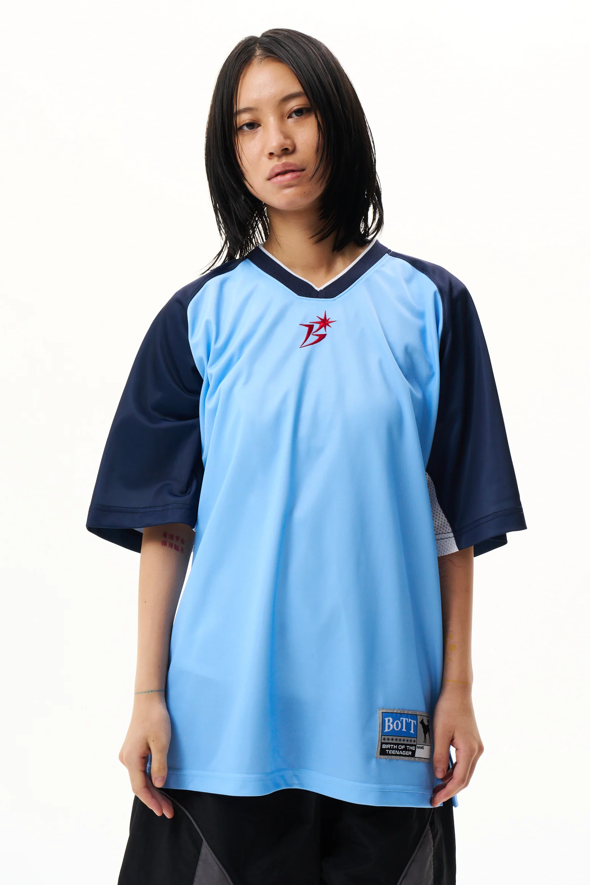 The Panelled Training Shirt Light Blue available online with global shipping, and in PAM Stores Melbourne and Sydney.