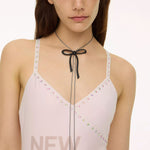 The HEAVEN - SANDY LIANG BOW BOLO NECKLACE  available online with global shipping, and in PAM Stores Melbourne and Sydney.