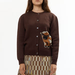 The BROWN BABY JACQUARD CALF CARDIGAN available online with global shipping, and in PAM Stores Melbourne and Sydney.