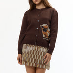 The BROWN BABY JACQUARD CALF CARDIGAN available online with global shipping, and in PAM Stores Melbourne and Sydney.