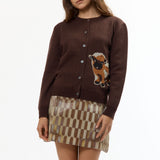 The BROWN BABY JACQUARD CALF CARDIGAN available online with global shipping, and in PAM Stores Melbourne and Sydney.
