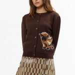 The BROWN BABY JACQUARD CALF CARDIGAN available online with global shipping, and in PAM Stores Melbourne and Sydney.