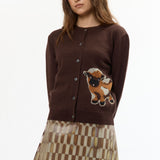 The BROWN BABY JACQUARD CALF CARDIGAN available online with global shipping, and in PAM Stores Melbourne and Sydney.