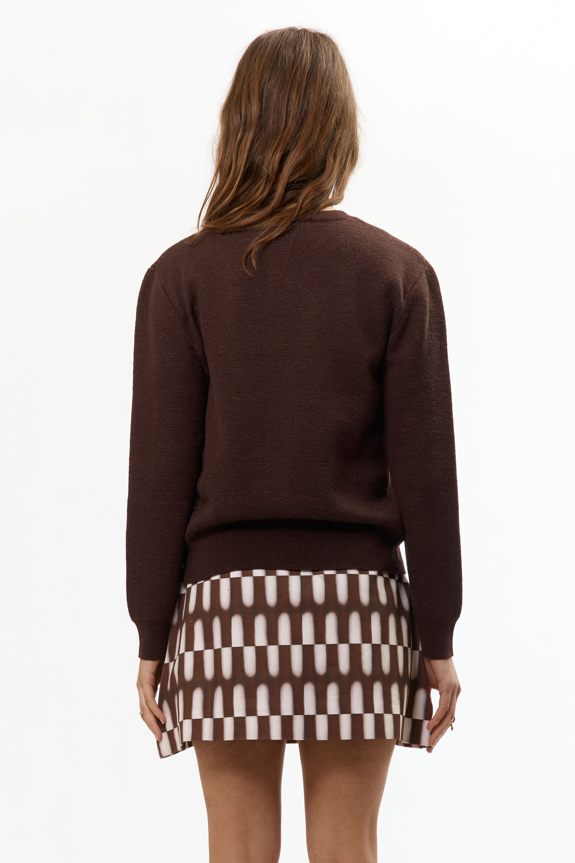 The BROWN BABY JACQUARD CALF CARDIGAN available online with global shipping, and in PAM Stores Melbourne and Sydney.