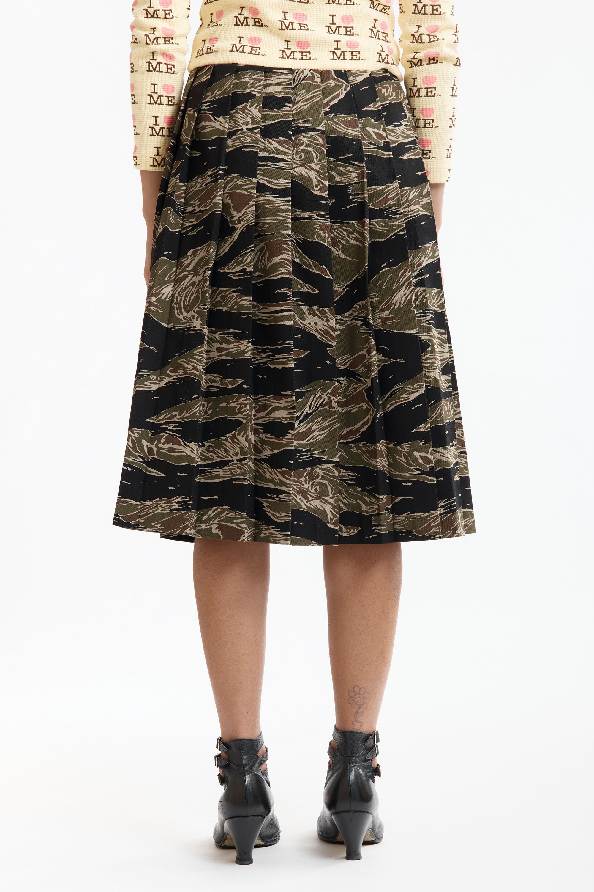 The CAMO PLEATED SKIRT available online with global shipping, and in PAM Stores Melbourne and Sydney.
