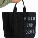 The NEIGHBORHOOD - CAVAS TOTE BAG BLACK available online with global shipping, and in PAM Stores Melbourne and Sydney.