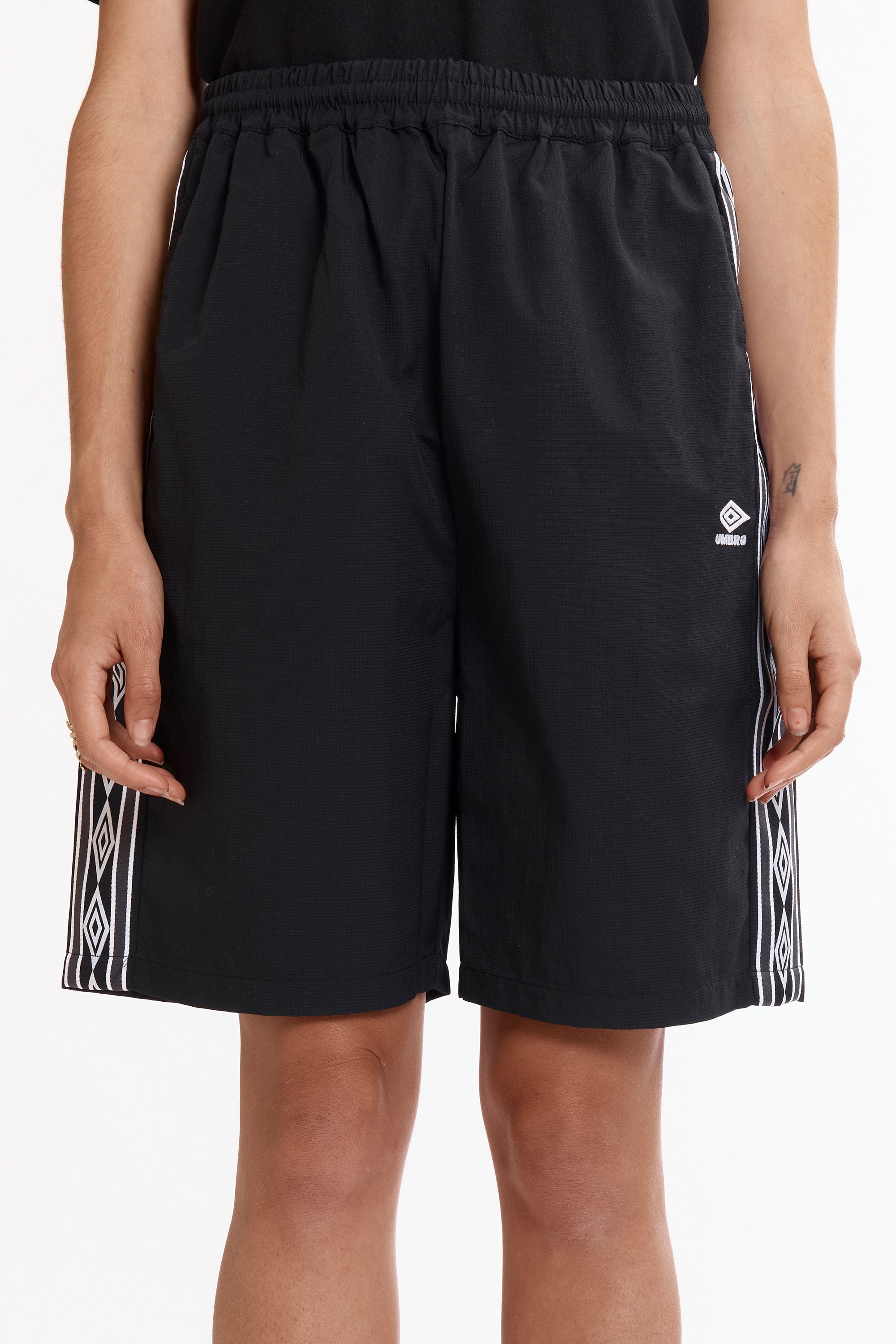 The Og Taped Shorts Carbon Black available online with global shipping, and in PAM Stores Melbourne and Sydney.