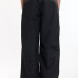 The Guarding Tracksuit Pants Black Charcoal available online with global shipping, and in PAM Stores Melbourne and Sydney.