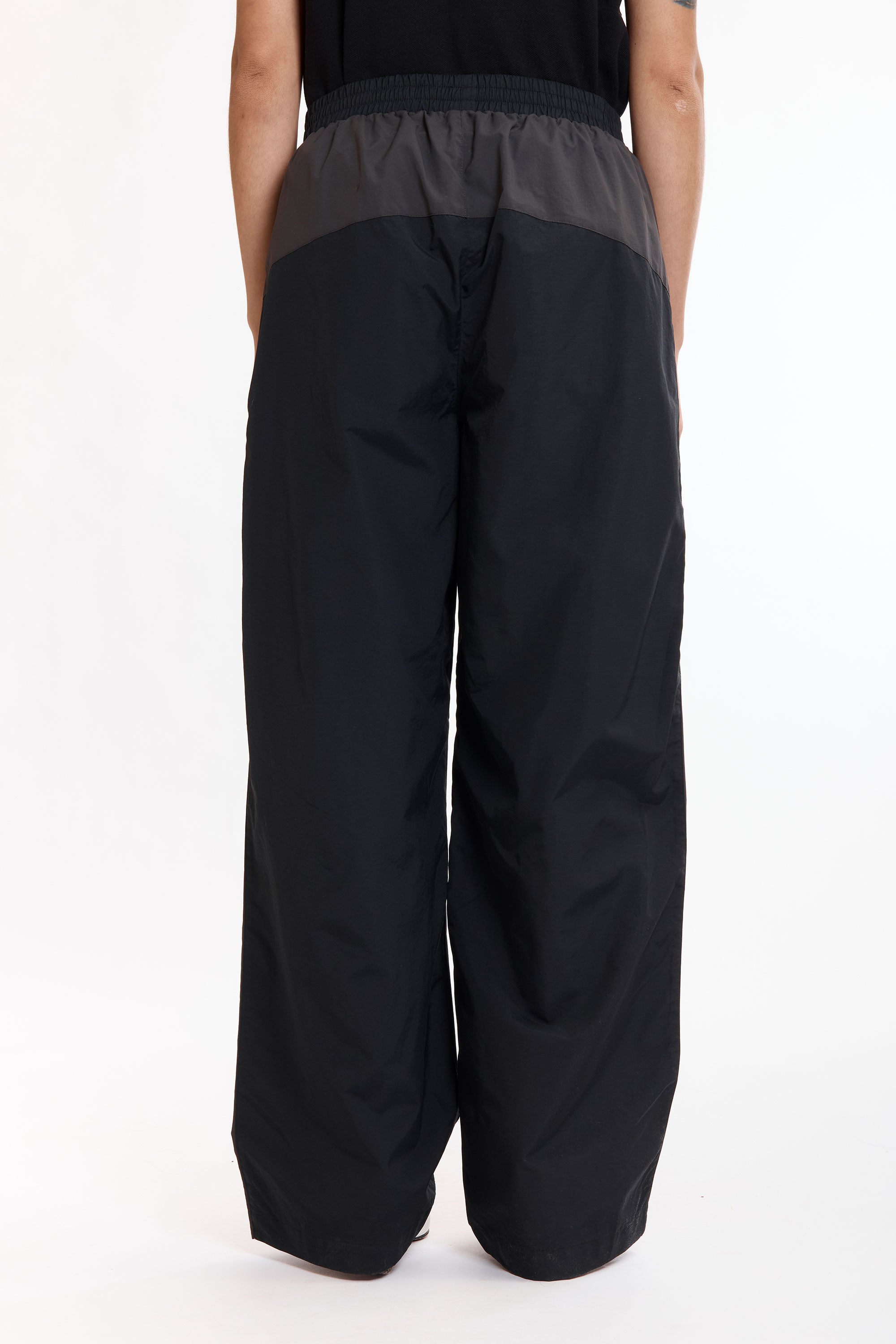 The Guarding Tracksuit Pants Black Charcoal available online with global shipping, and in PAM Stores Melbourne and Sydney.