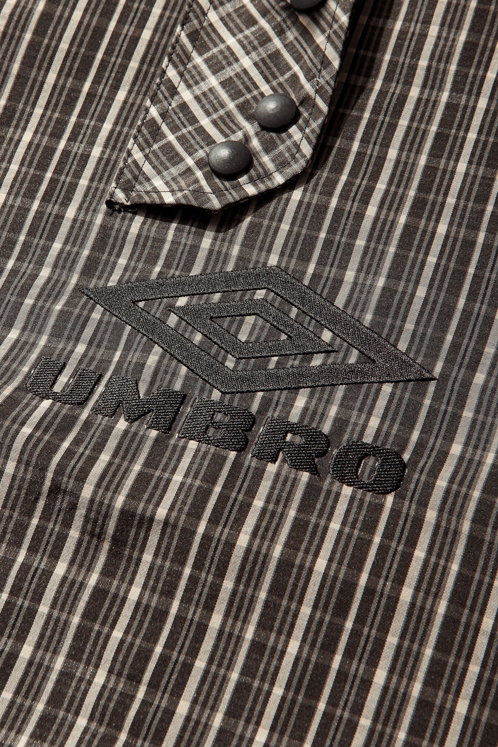 The Check Smock Anorak Beige Dark Brown available online with global shipping, and in PAM Stores Melbourne and Sydney.