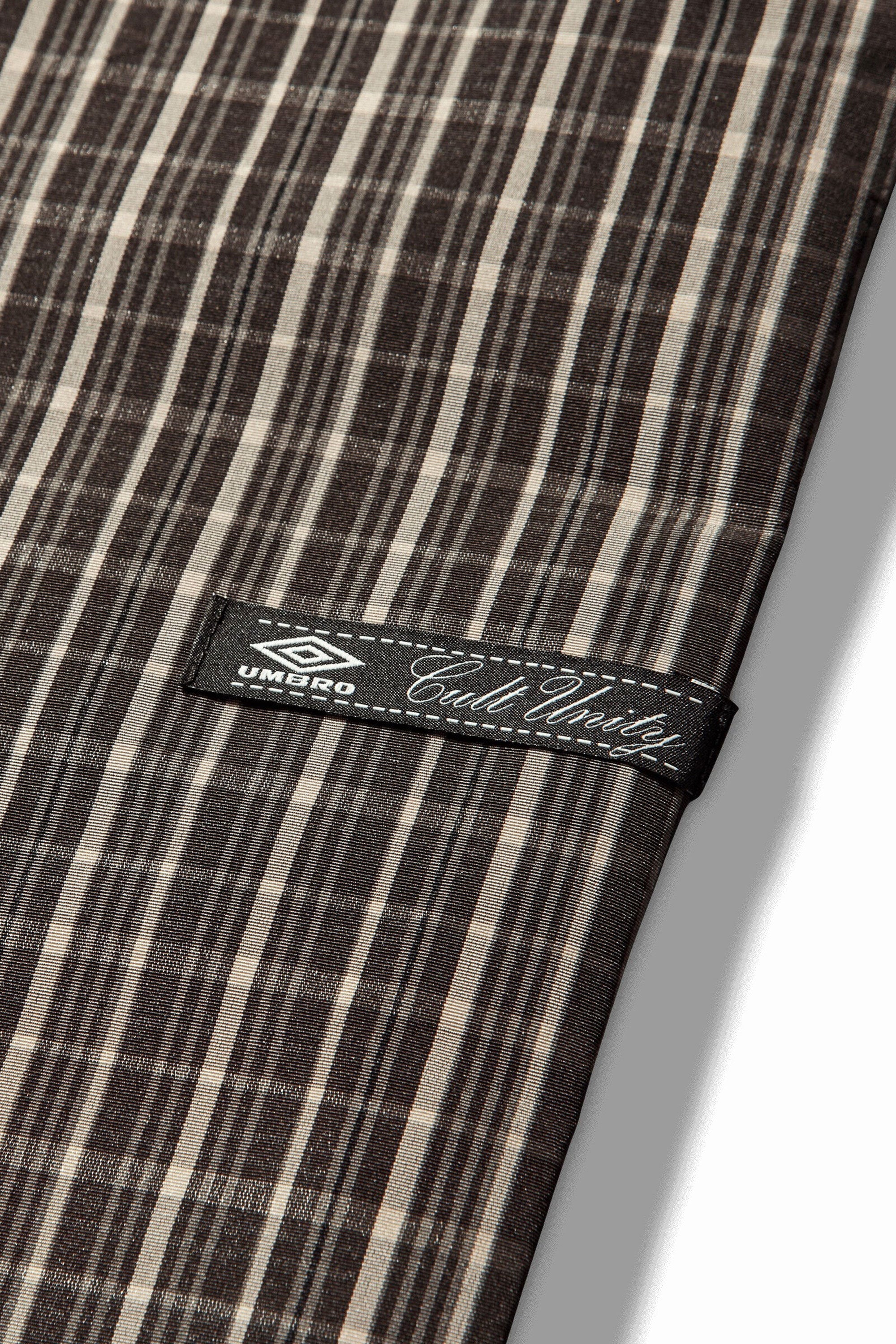 The Check Smock Anorak Beige Dark Brown available online with global shipping, and in PAM Stores Melbourne and Sydney.