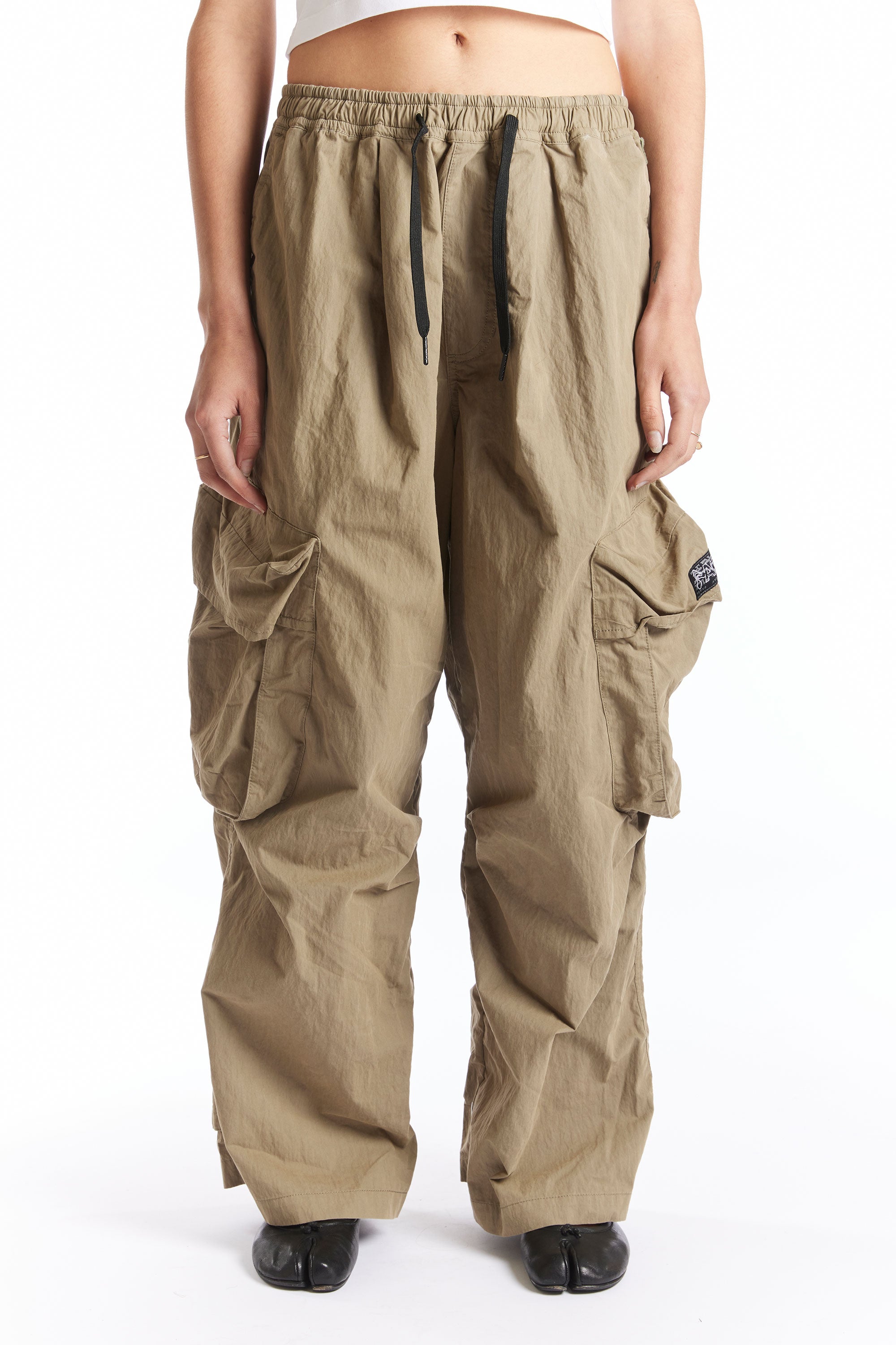 The WTTC CHOW PANTS ELM  available online with global shipping, and in PAM Stores Melbourne and Sydney.