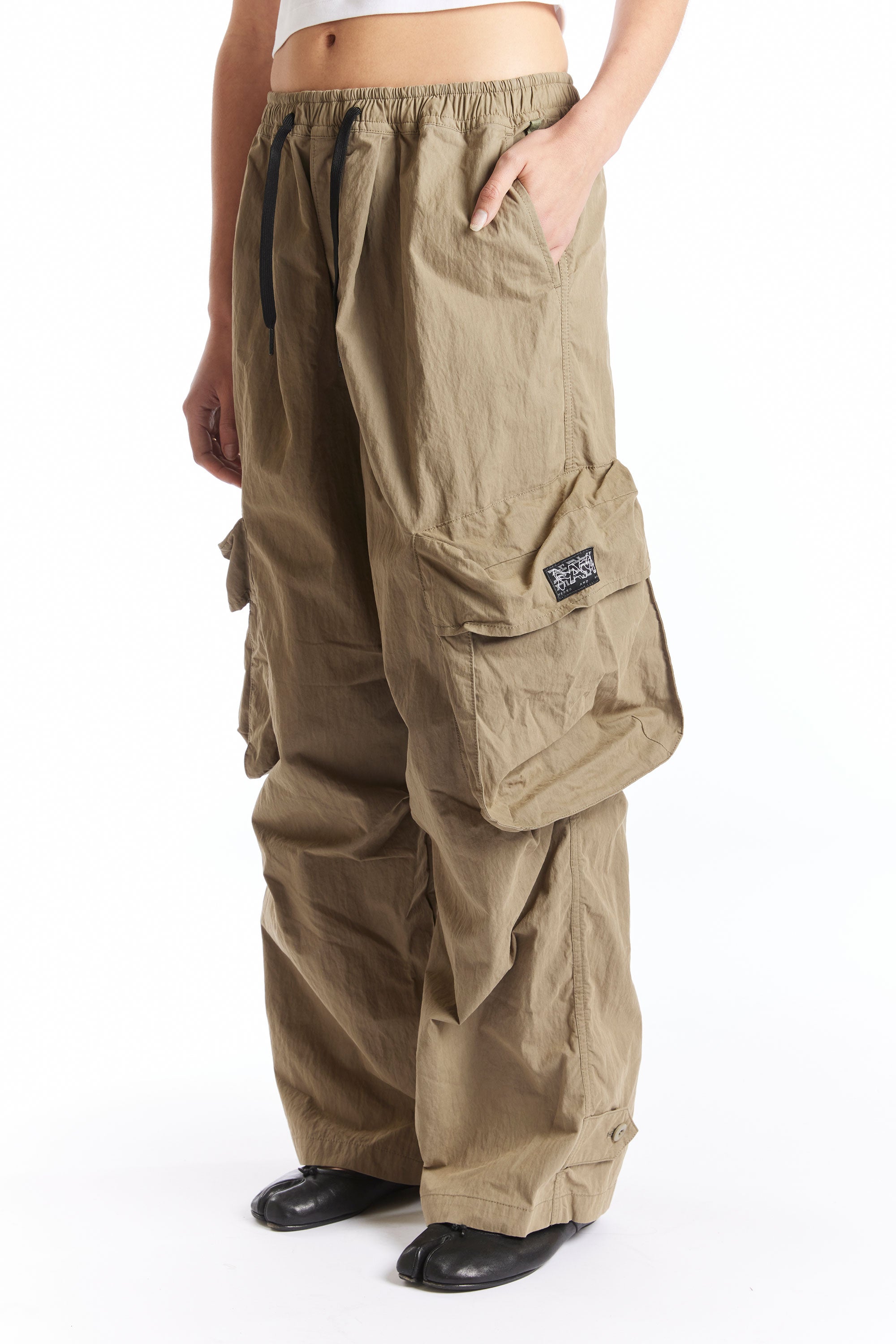 The WTTC CHOW PANTS ELM  available online with global shipping, and in PAM Stores Melbourne and Sydney.