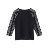 The COBRA 3/4 Sleeve Crop T-Shirt Black available online with global shipping, and in PAM Stores Melbourne and Sydney.