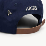 The ARIES - COLUMN A CAP NAVY  available online with global shipping, and in PAM Stores Melbourne and Sydney.