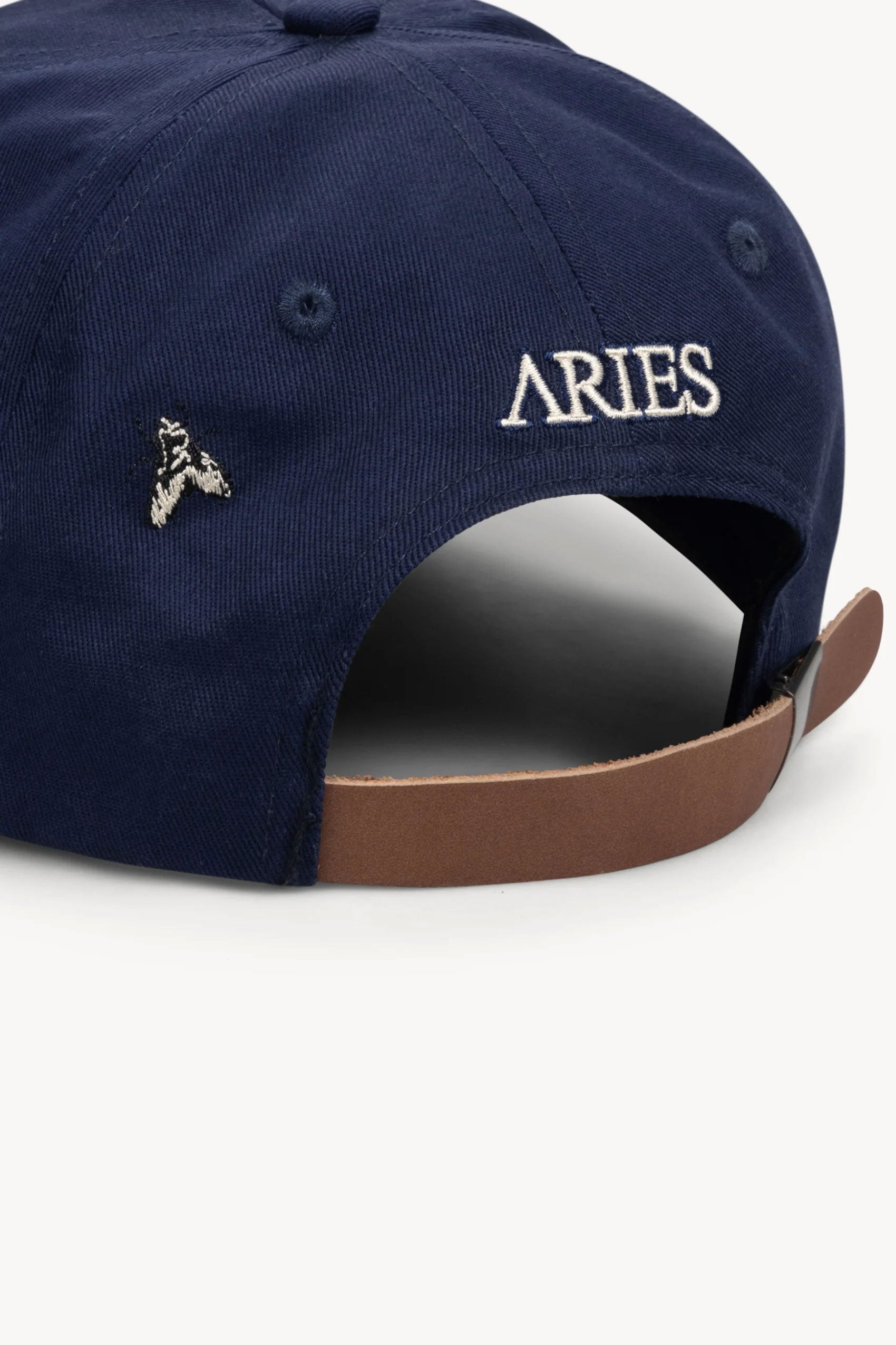 The ARIES - COLUMN A CAP NAVY  available online with global shipping, and in PAM Stores Melbourne and Sydney.