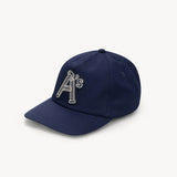 The ARIES - COLUMN A CAP NAVY  available online with global shipping, and in PAM Stores Melbourne and Sydney.