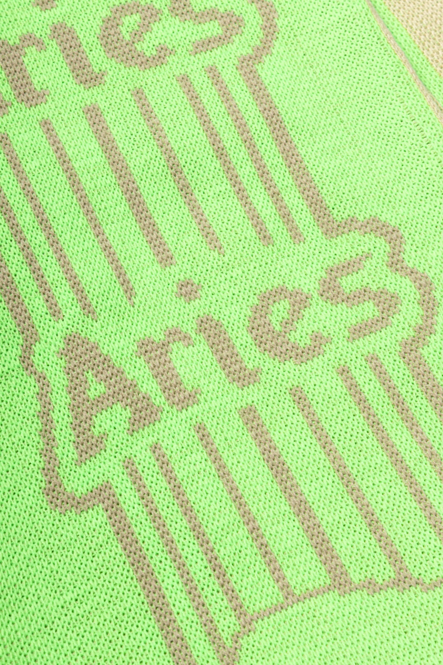 The ARIES - COLUMN SCARF FLUORO GREEN  available online with global shipping, and in PAM Stores Melbourne and Sydney.