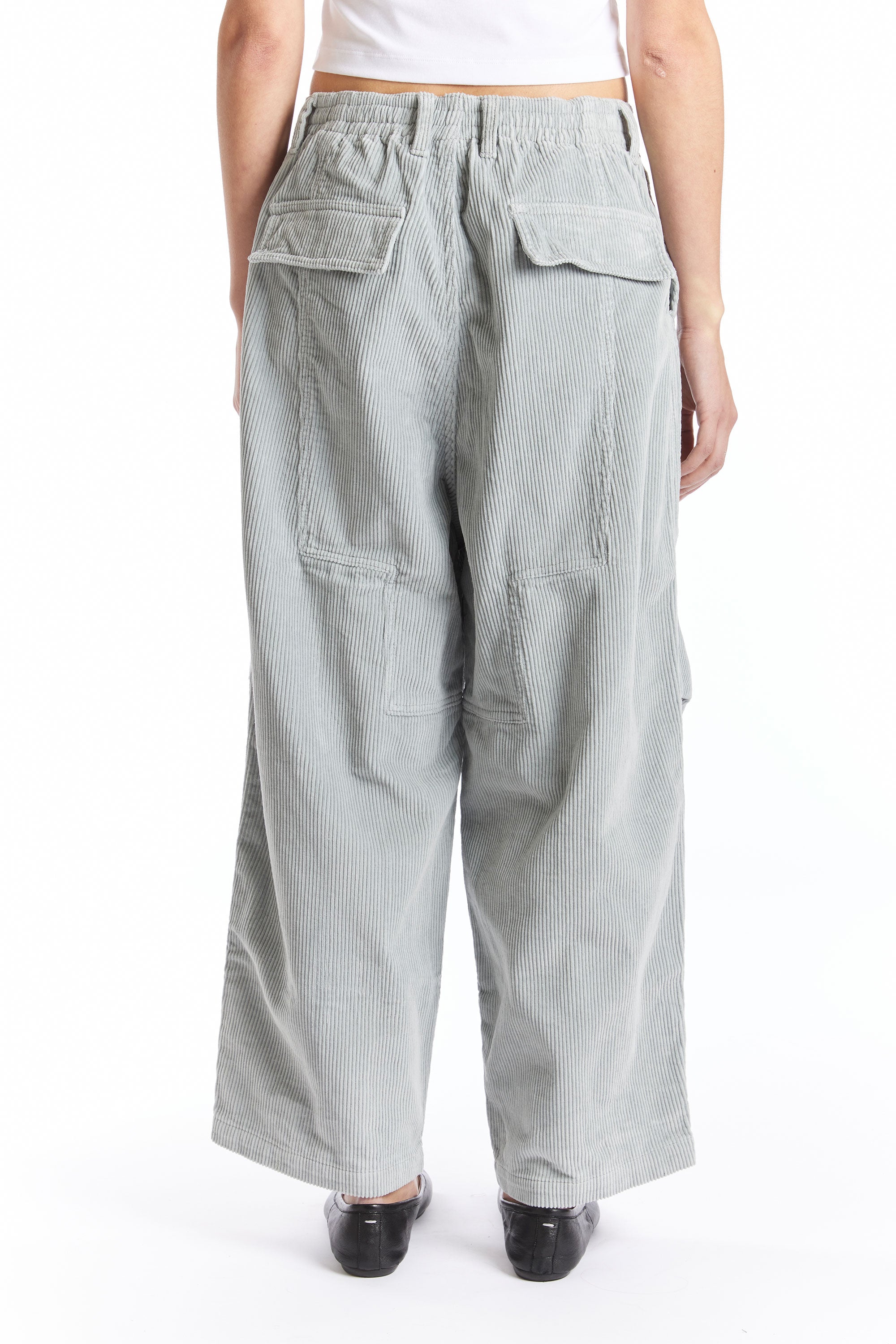 The CORDUROY PONDERING PANT SKY GREY  available online with global shipping, and in PAM Stores Melbourne and Sydney.