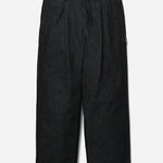 The SS26 DENIM TUCK PANTS BLACK available online with global shipping, and in PAM Stores Melbourne and Sydney.