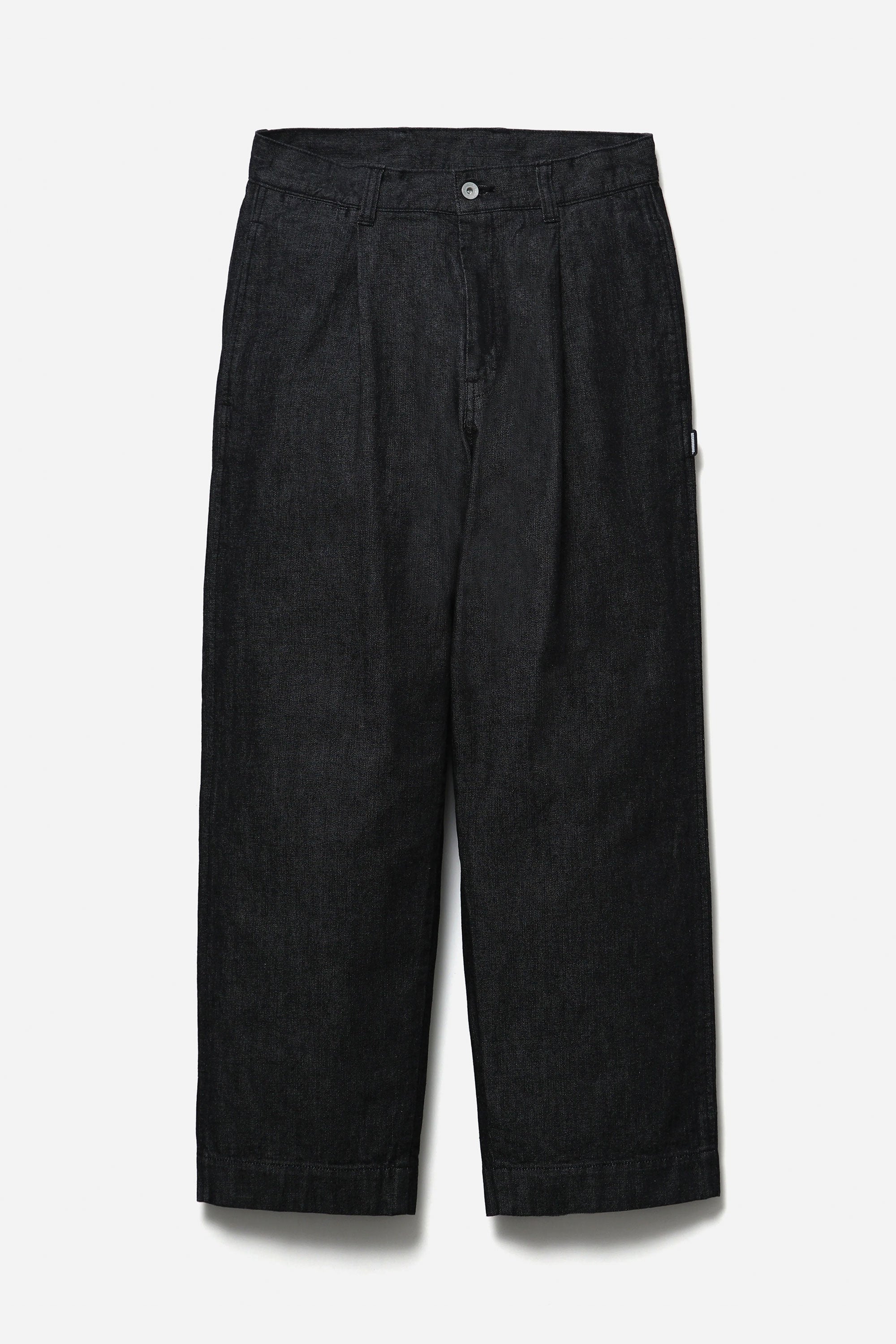 The SS26 DENIM TUCK PANTS BLACK available online with global shipping, and in PAM Stores Melbourne and Sydney.
