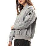 The DOUBLE HENLEY SWEATSHIRT GREY available online with global shipping, and in PAM Stores Melbourne and Sydney.