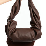 The KARLA LAIDLAW - EMS BAG SMALL BROWN  available online with global shipping, and in PAM Stores Melbourne and Sydney.