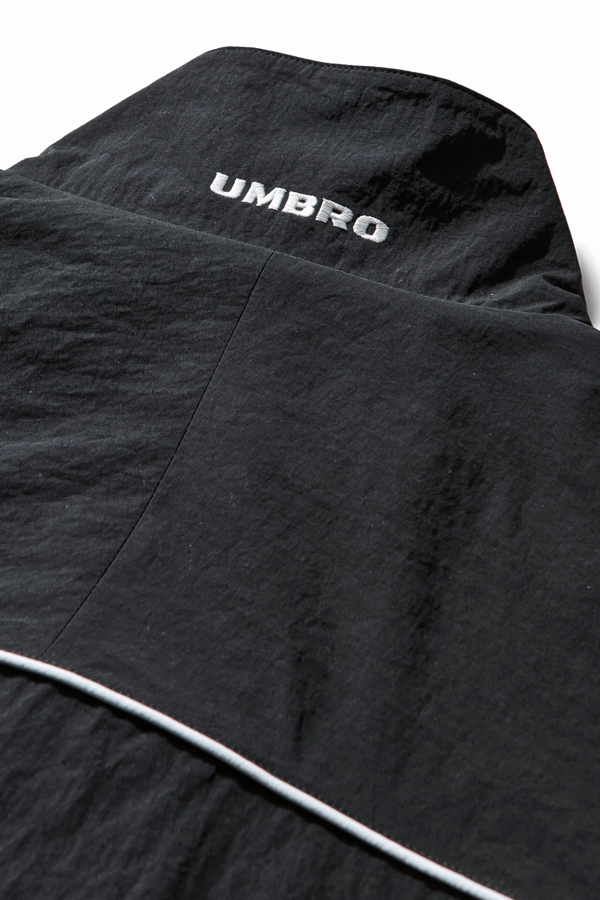 The SS26 Eyes Tracksuit Carbon Black available online with global shipping, and in PAM Stores Melbourne and Sydney.